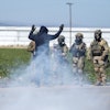 ederal immigration agents toss tear gas at protesters during a raid in the agriculture area of Camarillo, Calif., Thursday, July 10, 2025.
