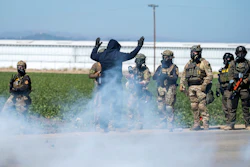 ederal immigration agents toss tear gas at protesters during a raid in the agriculture area of Camarillo, Calif., Thursday, July 10, 2025.