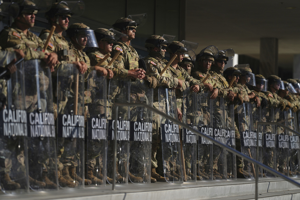 California National Guard troops lined up with riot shields in formation