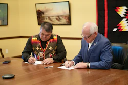 Chief Executive Virgil Wind of the Mille Lacs Band of Ojibwe and Governor Tim Walz sign a Tribal-state cannabis compact on Sept. 10, 2025.