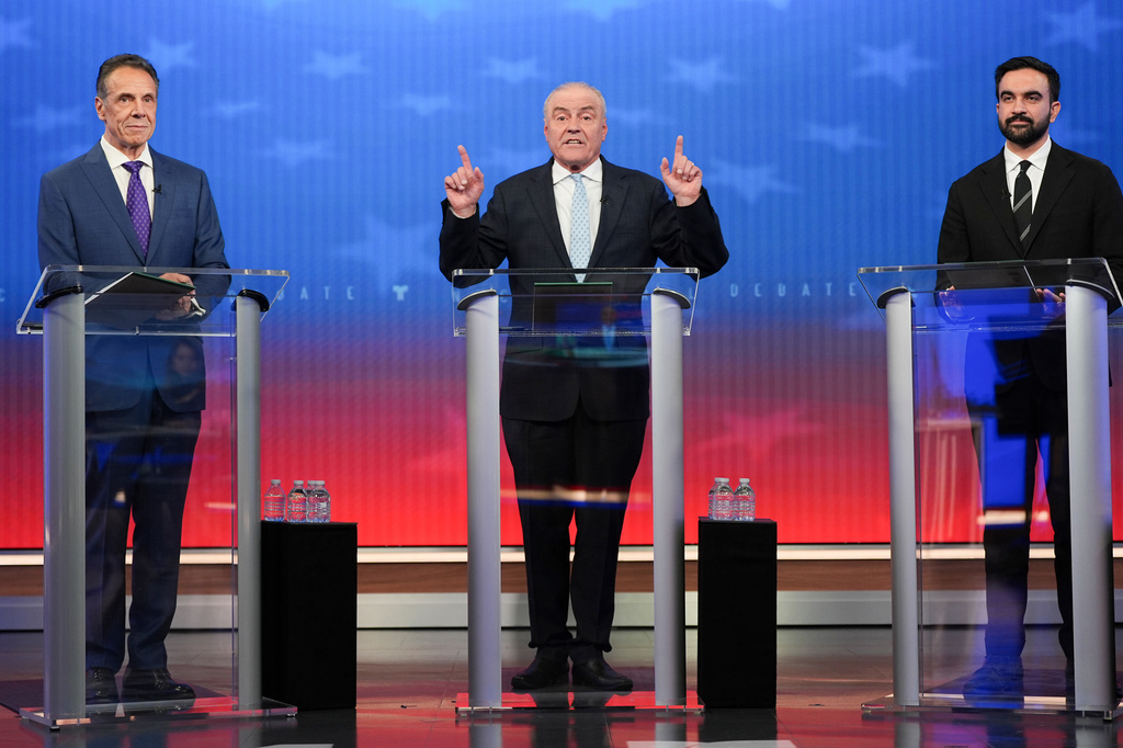 Republican candidate Curtis Sliwa, center, speaks during a mayoral debate with independent candidate former New York Gov. Andrew Cuomo, left, and Democratic candidate Zohran Mamdani, Thursday, Oct. 16, 2025, in New York.