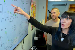 Carrie Cuttler, right, an associate professor in the Department of Psychology at WSU, points to a screen displaying data about caloric intake and THC, while Ryan McLaughlin, an associate professor in the Department of Integrative Physiology and Neuroscience in WSU’s College of Veterinary Medicine, looks on. Cuttler and McLaughlin co-direct The Health and Cognition (THC) Lab.