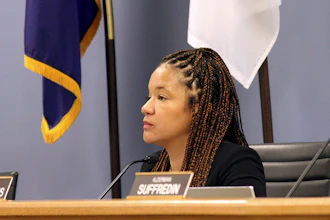 In this Nov. 25, 2019 file photo, Alderman Robin Rue Simmons, 5th Ward, proposes a reparations fund during a City Council meeting in Evanston, lll.
