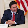 Florida Gov. Ron DeSantis speaks before a roundtable discussion on college sports in the East Room of the White House in Washington, March 6, 2026.