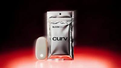 Curv by Bloom silver metallic pouch and white device on red gradient background