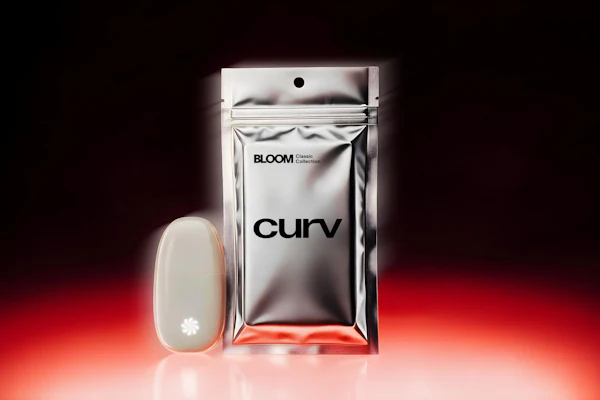 Curv by Bloom silver metallic pouch and white device on red gradient background
