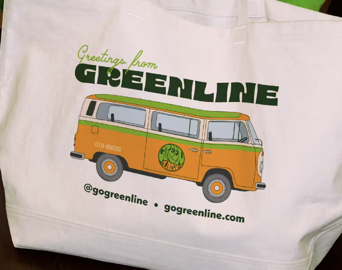 GO Greenline vintage bus tote bag with orange and green retro van graphic and contact information